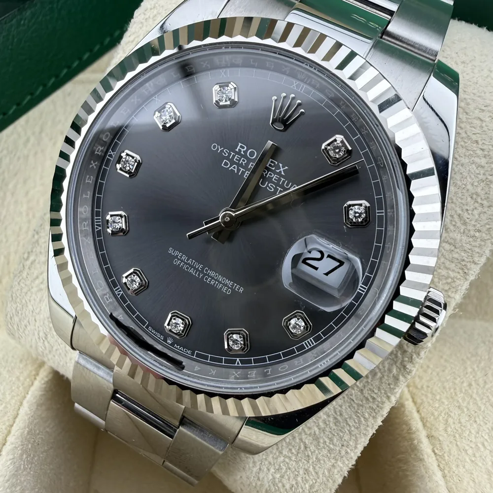 Rolex Datejust 41 126334, rhodium dial with diamond hour markers, front view in its box